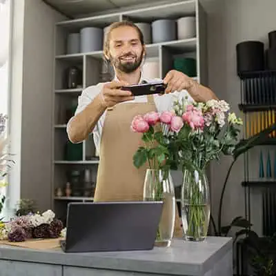 florist takes video for social media video strategy marketing