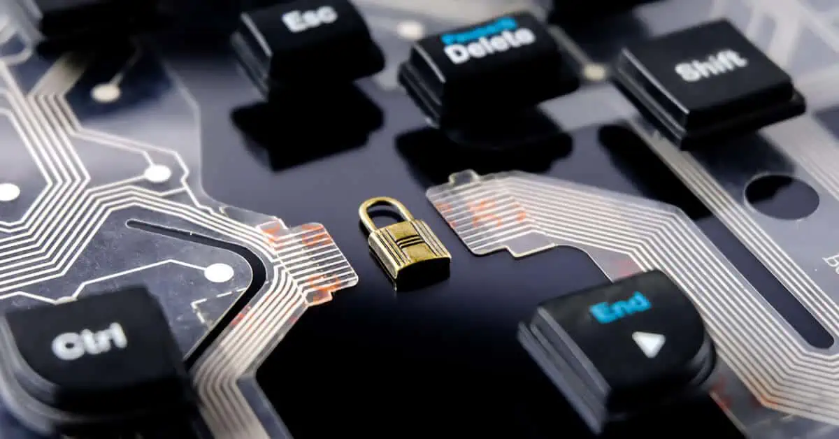 a lock on computer parts to represent cybersecurity